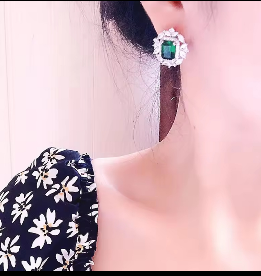 Emerald green diamond cut studs