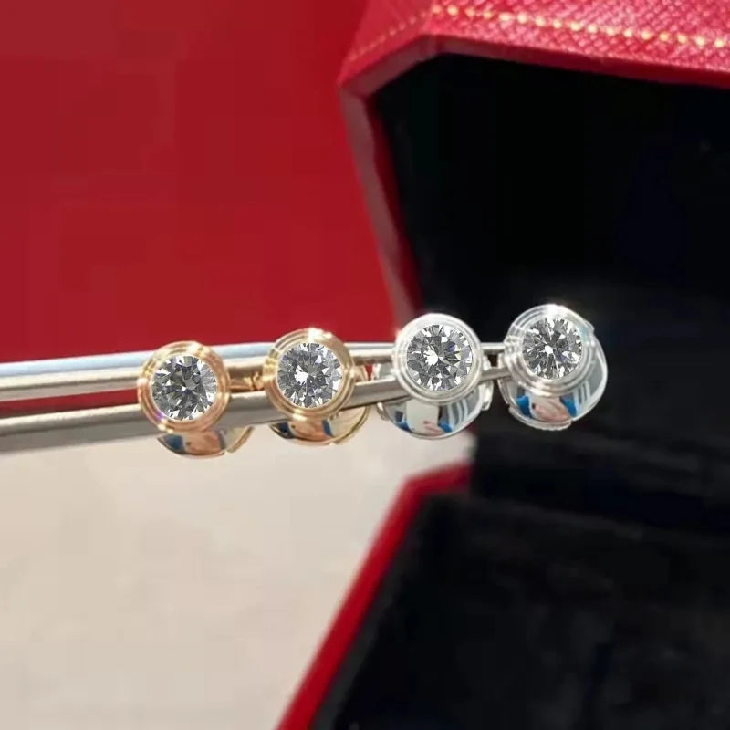Famous designer studs Available in white n rose gold plating