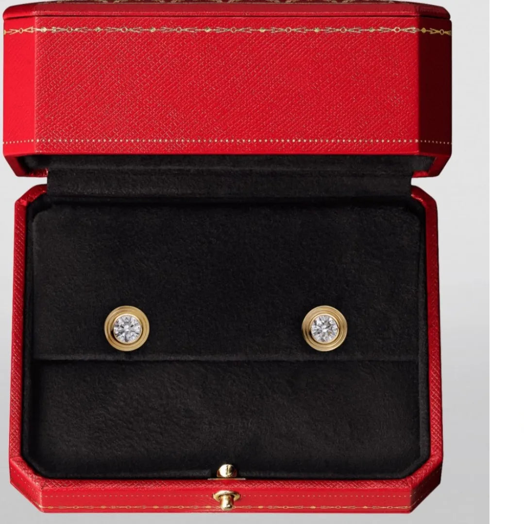 Famous designer studs Available in white n rose gold plating