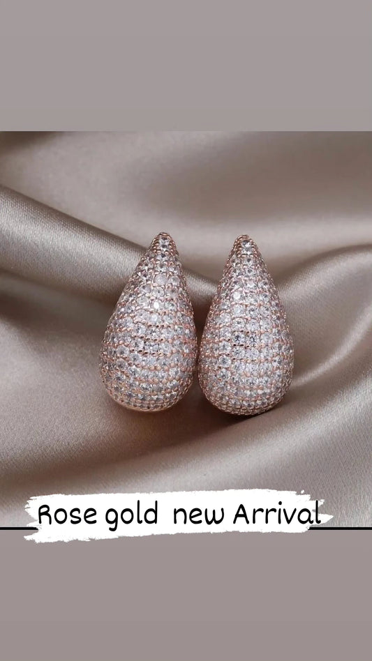 Semi circular studded earrings