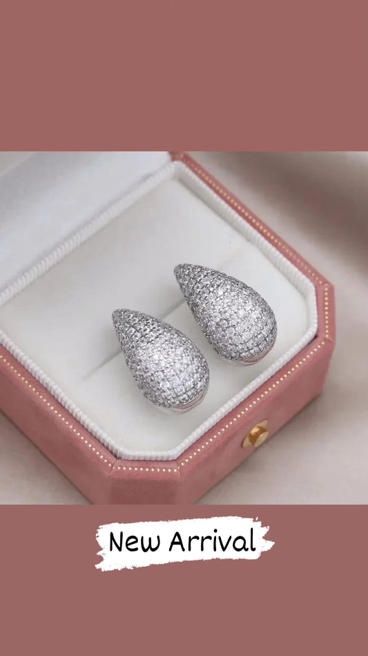 Semi circular studded earrings