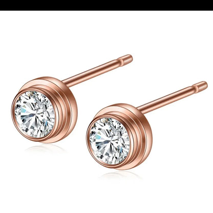 Famous designer studs Available in white n rose gold plating