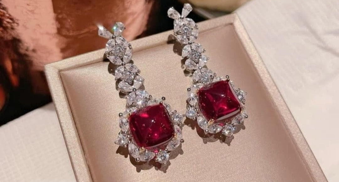 Dangling ruby earrings